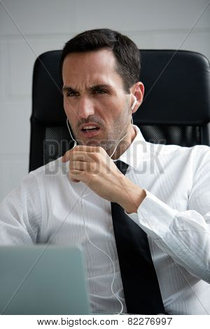 male businessman with earphones
