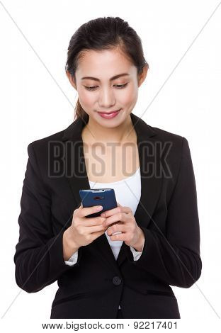 Businesswoman read the message on cellphone