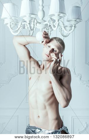 Male albino wipes the tears from his eyes he had white skin.