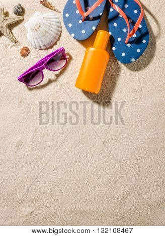 Some beach accessories with copy space on the bottom