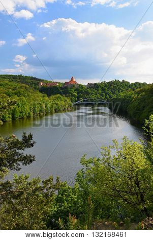 Beautiful Gothic castle Veveri. The city of Brno at the Brno dam. South Moravia - Czech Republic - Central Europe. Spring landscape.