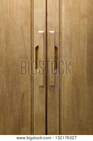 wood door handle with wood door background