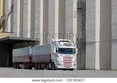 SALO, FINLAND - MAY 27, 2016: Scania R560 truck for grain transport outside of granary in South of Finland.