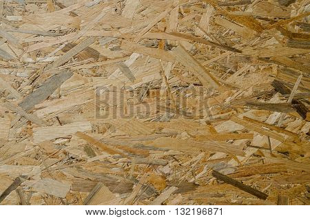 surface of recycled pressed tree shavings. background texture