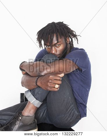 young handsome afro american man, angry look, weed junky isolated on white, problem teenage, depression greef, sad guy