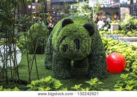 Laval, Canada - May 26, 2016:Beautiful garden decoration in Carrefour Laval Tropical Botanical Garden. Banda made by plants in Tropical Botanical Garden