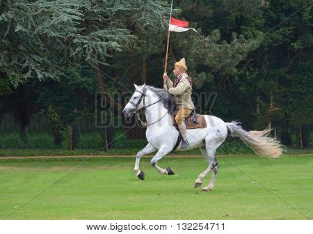 Silsoe, Bedfordshire, England - May 30, 2016:  A member of the Punjab Lancers in World War One uniform riding a white horse.