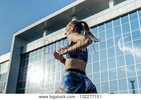 Chelyabinsk Russia - May 24 2016: girl runner participant of race stayers distance of 1500 meters during UrFO Championship in athletics