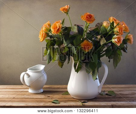 Beautiful rose flower bouquet on wooden table