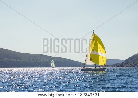Tivat, Montenegro - 26 April, Two yachts on calm wate, 26 April,. 2016.
Regatta 