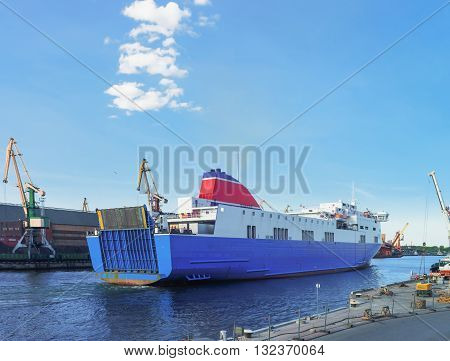 Ferry On Venta River In Ventspils In Latvia