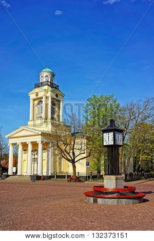 Clock And Lutheran Saint Nicholas Church In Ventspils