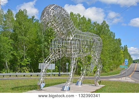 BROMONT QUEBEC CANADA JUNE 01 2016: By Mathieu Isabelle new statue in Bromont. The home of the Parc equestre Olympique de Bromont, equestrian park.