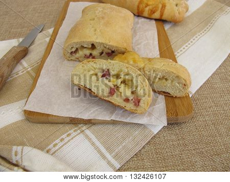 Hand bread filled with cheese and ham