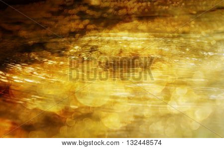 Sparkle Ans Shining Bokeh On Golden River Or Stream Water Surface With Luxury Romantic Abstract Back