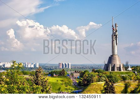 KIEV, UKRAINE - MAY 09: The Motherland Monument also known as Rodina-Mat', decorated with red poppy flower wreath on Victory Day, devoted the Great Patriotic War. May 09, 2016 in Kiev, Ukraine
