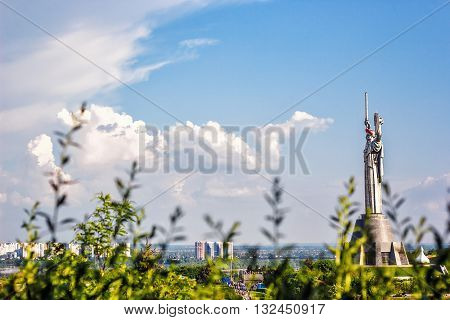 KIEV, UKRAINE - MAY 09: The Motherland Monument also known as Rodina-Mat', decorated with red poppy flower wreath on Victory Day, devoted the Great Patriotic War. May 09, 2016 in Kiev, Ukraine