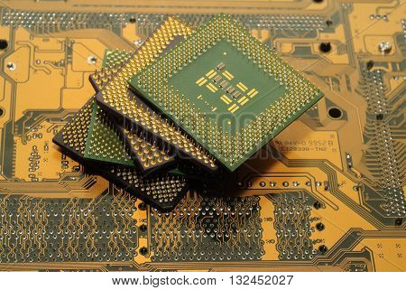 Stack of CPU processor and Circuit board / Motherboard. Electronic computer hardware technology. Motherboard digital chip. Tech science. Information engineering component.