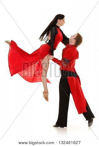 Dancing young couple on a white background.