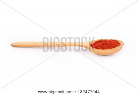 sumac powder spices on spoons isolated on a white background
