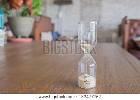 sandglass with decoration sandglass on table sandglass of five minute brown sandglass sandglass alarm sandglass working accurate sandglass