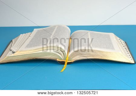 Open Book On Light Table. Back To School. Copy Space