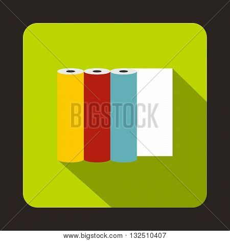 Rolls of colored paper icon in flat style on a green background