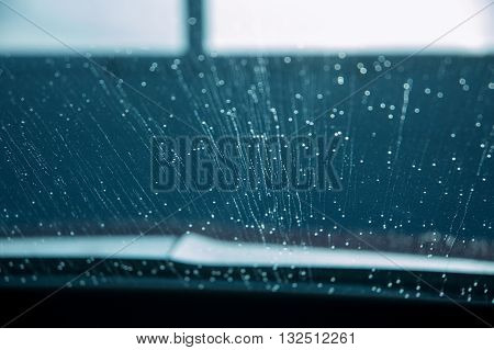 Water drops on windshield at car wash