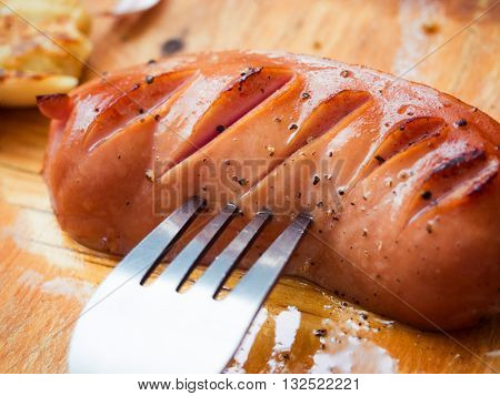 delicious fried sausage lying on the Board