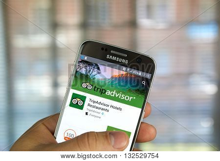 MONTREAL CANADA - MAY 23 2016 : TripAdvisor application on Samsung s7 phone screen. TripAdvisor Inc. is an American travel website company providing reviews of travel-related content.