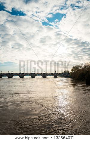 Old stony bridge in Bordeaux, France Europe