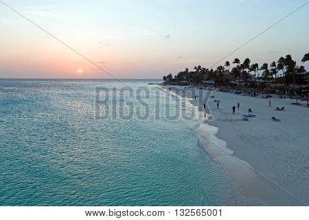 Aerial from Manchebo beach on Aruba island in the Caribbean Sea at sunset