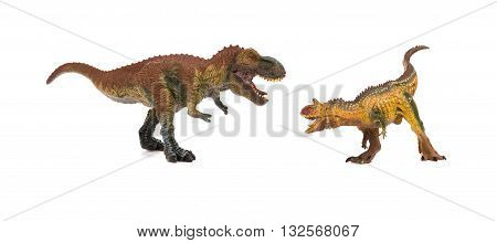 tyrannosaurus and carnotaurus on a white background