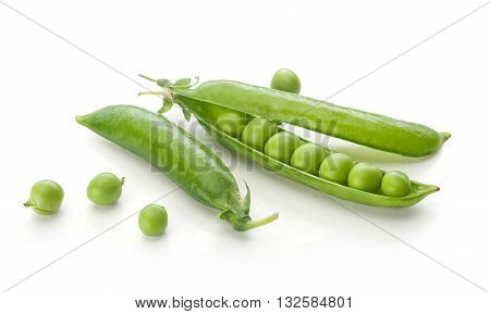 Isolated fresh green pea pods and peas on the white background