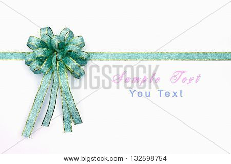 Beautiful blue and gold bow on white background