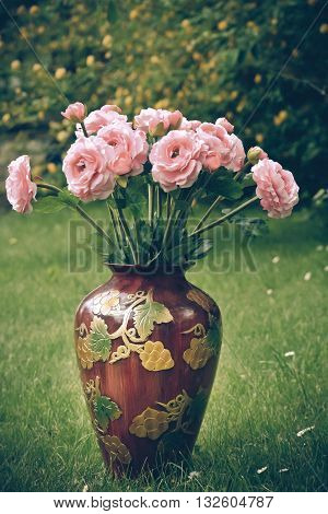 artificial peonies in a vase painted decorative
