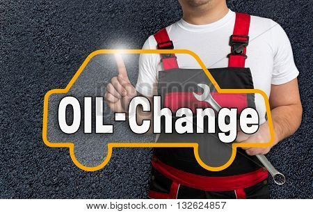 Oil Change Touchscreen Is Operated By Car Mechanics