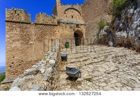 medieval fortress of Acrocorinth up on the hill against clear blue sky