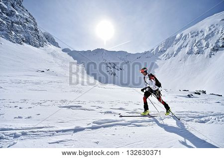 FAGARAS ROMANIA - MARCH 5: Ski mountaineer competes during the Ski Mountaineering National Competition in Fagaras Mountains Carpathian Range on March 5 2016 in Romania.