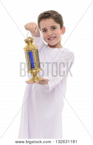 Muslim Boy In White Djellaba Celebrating Ramadan With Lantern