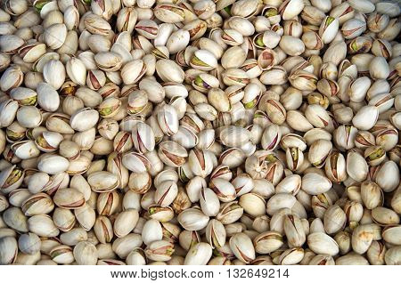 Piles of pistachio nuts  in market place