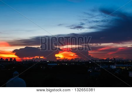 Twilight sunset light at city of Bangkok with building silhouette