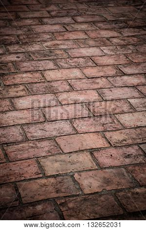 Dirty Antique floor bricks in the Songkhla park