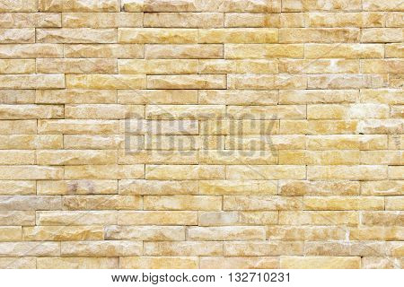 texture of the old sandstone wall for backgroundSandstone wall backgroundPattern of Sandstone Brick Wall Surfaced