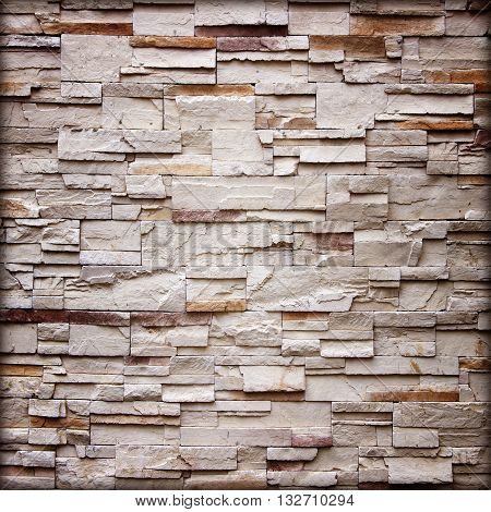 texture of the stone wall for backgroundSandstone wall backgroundPattern of Sandstone Brick Wall Surfaced