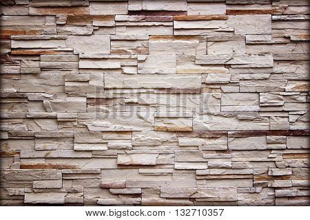 texture of the stone wall for backgroundSandstone wall backgroundPattern of Sandstone Brick Wall Surfaced