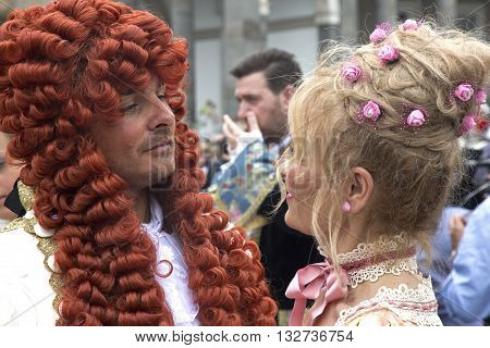 Naples, Italy. May 29, 2016: Participants of the parade of traditional carriages with actors in historical costumes to commemorate  the three hundredth anniversary of the birth of Charles of Spain who was King of Naples from 1734 to 1759