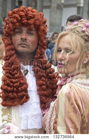 Naples, Italy. May 29, 2016: Participants of the parade of traditional carriages with actors in historical costumes to commemorate  the three hundredth anniversary of the birth of Charles of Spain who was King of Naples from 1734 to 1759
