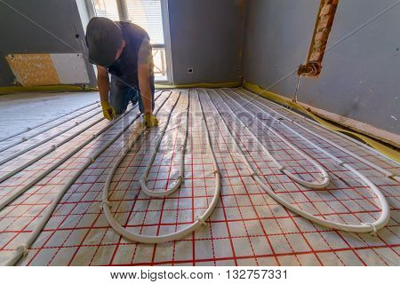 pipefitter installing system of heating