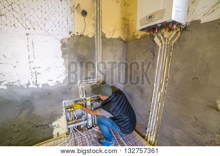 pipefitter installing system of heating